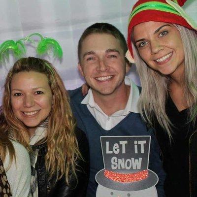 Michel, Skylar and Crystal at a holiday party.