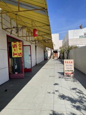 alley view of shop entrance