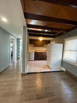 Kitchen+ entrance hallway Cabin At the Beach https://theamericanahotel.com/properties/cabin-at-the-beach/