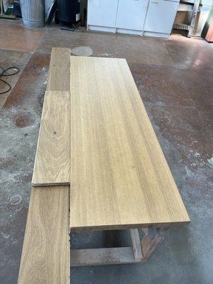 Color matching a new oak bench for a mud room.  The floor sample is the color.