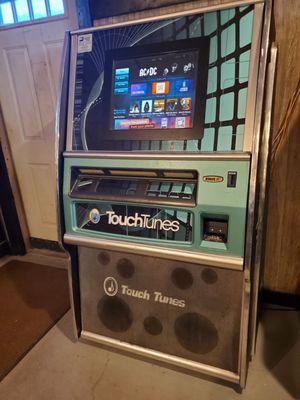 Looks old school but it's TouchTunes