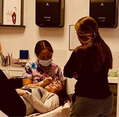 My mom getting brows correction by Rhainne