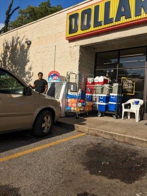 The manager is shown here far outside of the designated break / smoking area for Dollar General employees at store # 6598 as well.