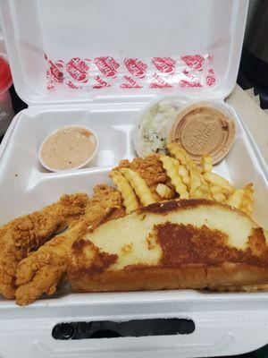 Chicken tenders, toast, and fries.