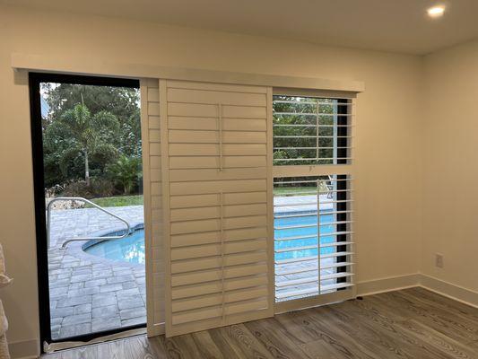 These bypass door shutters have a split tilt to allow for privacy AND natural light to come into your room. Great solution!!