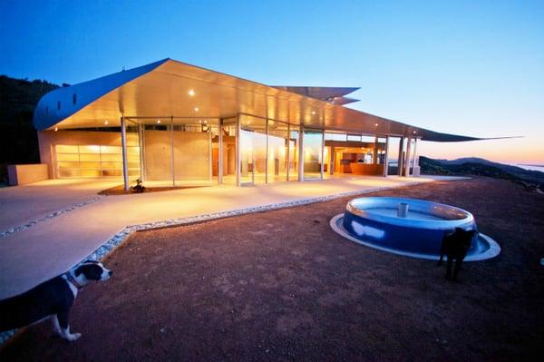 Green Leaf Doors in this 747 Wing House in Malibu, by David Hertz Architects