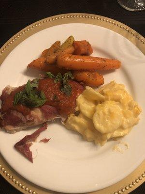 Chicken saltimboca with carrots and gratin potatoes