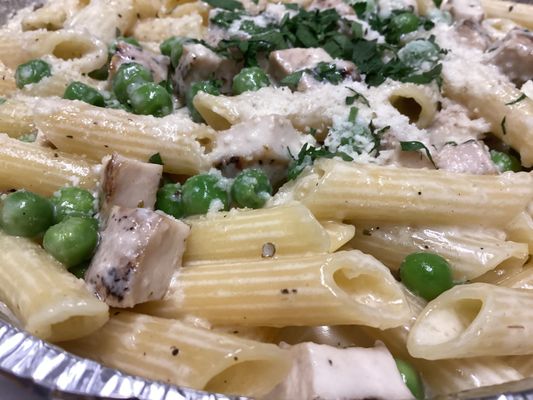 Gluten free penne Alfredo with grill chicken and peas