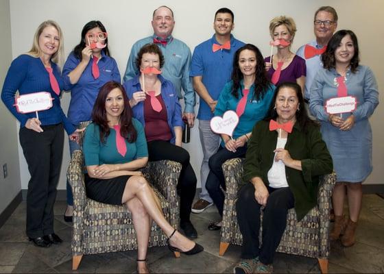 Herndon Pharmacy team taking on the red tie challenge to raise awareness about bleeding disorders.