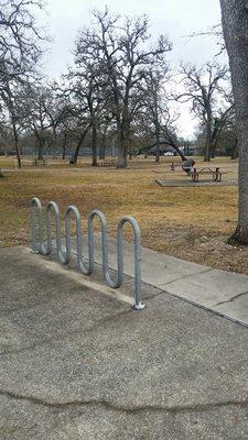 Bike rack, picnic tables and bbq grills