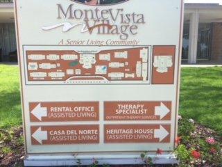 Sign outside of Monte Vista Village along Massachusetts Ave.