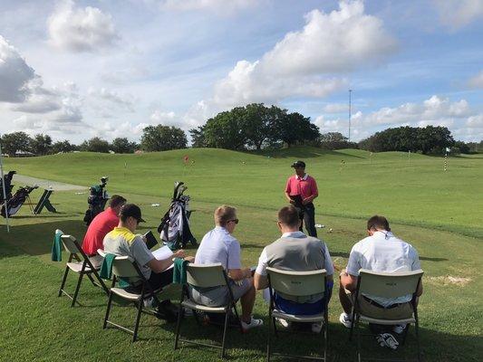 Chris teaching a 2 day golf school. Going through workbooks and discussing proper fundamentals.