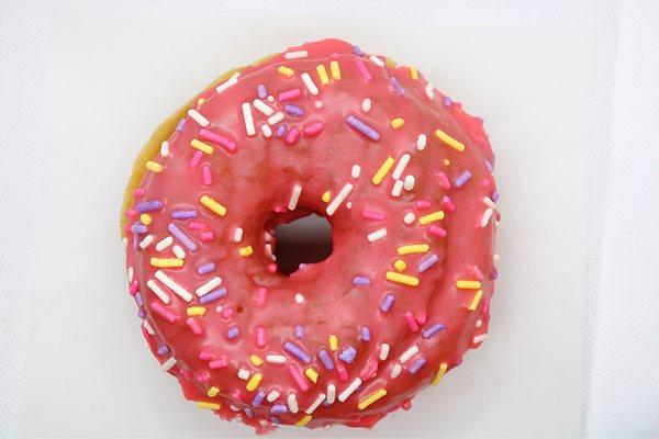 Raspberry sprinkle raised donut