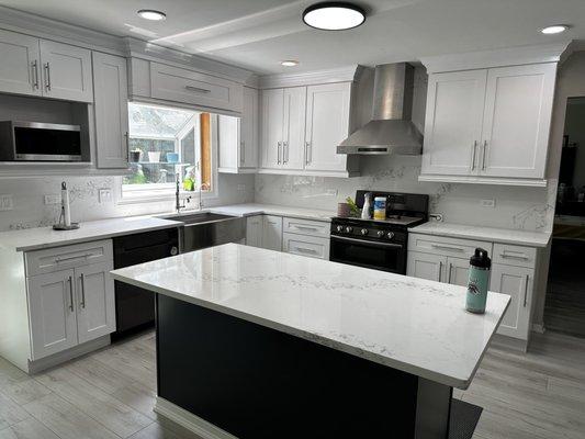 Shaker White Cabinets with Calacatta Bearhug Quartz countertops