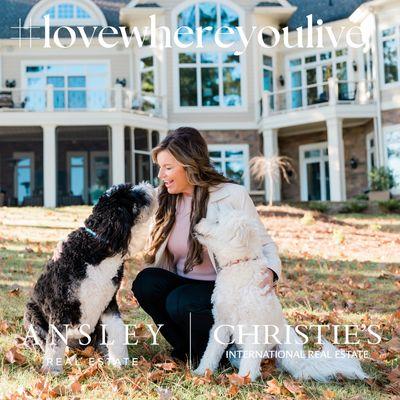 Jennifer Vaughan Realtor with her doodles Arya and Elsa in front of her home in Reynolds Lake Oconee