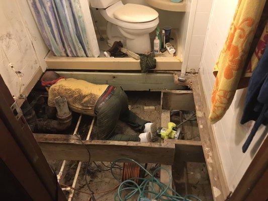 Tearing out bathroom flooring and framing