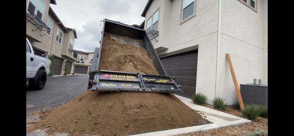 Top soil delivery. Before a SOD install