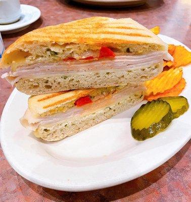 Blockbuster Panini: Turkey, roasted red peppers, provolone cheese, and Mayo pesto on ciabatta bread