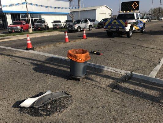 Clean up of debris on I Street and 11th, in front of Martens Chevrolet in Reedley Ca