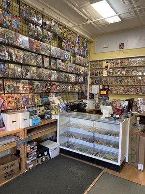 The reception desk and the first thing that you see when you enter through the door of the comic warehouse store.