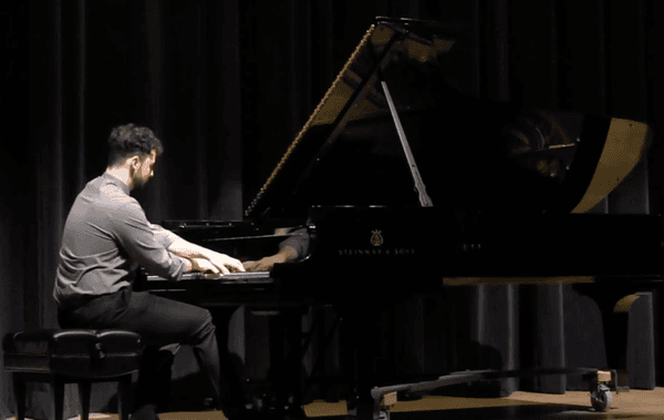 Solo music recital at Indiana University Bloomington, Indiana. Benjamin Gamze, manager and founder of NorthShore PianoForte.