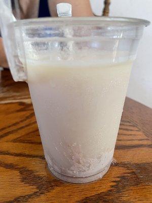 Agua vieja. Horchata gone bad. Thick layer of chunky sediment