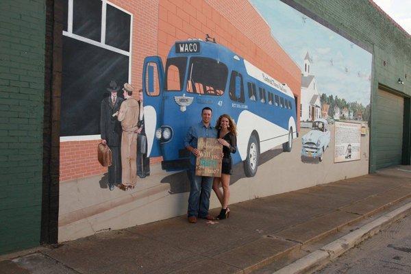 We do custom signs! These cuties got engaged at the Bus Depot!