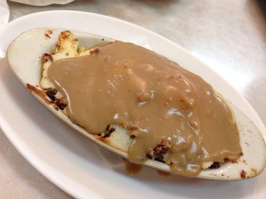 Care to guess what this might be? No? Shepard's pie. With gravy. Close up to follow.