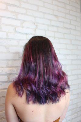 Share your individuality with the world by wearing a vibrant, jewel-toned balayage