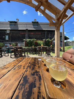 A flight of beer and siders with the sitting area in the background