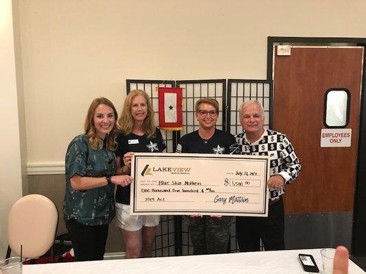 Mattson Financial prides themselves on giving back! Here is our team with one of our ACE (Annual Charity Event) winners in 2019