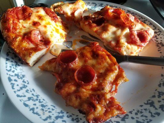 Bella sharing a plate with primo and Paul's the next day. The United Colors of pizza.