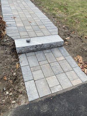 brick paver front walkway with granite steps