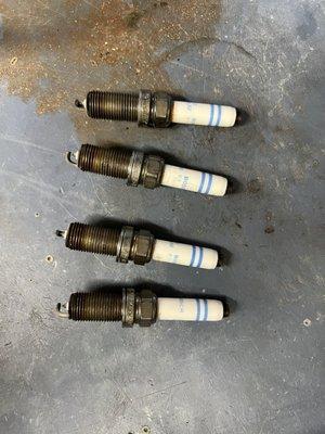 Old spark plugs that were "replaced" last month.