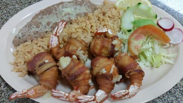 We invite u to come in an try our very  delicious shrimp  wrapped in bacon .