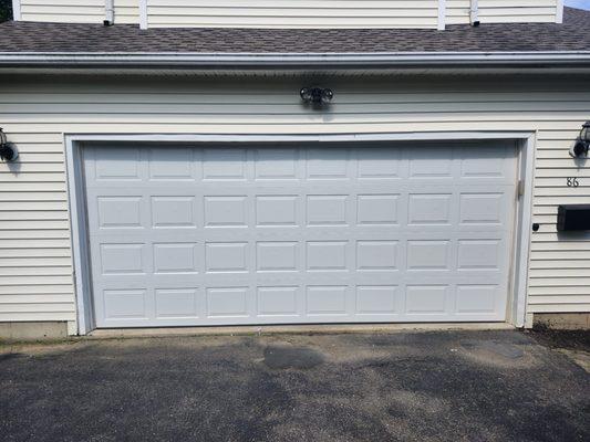 Before + After  Non insulated garage door off track to a new insulated garage door