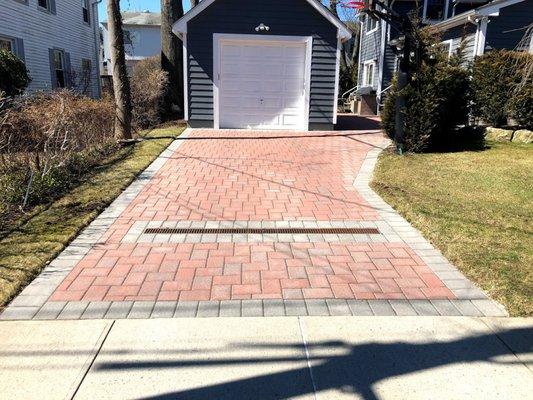 Driveway with storm drain.