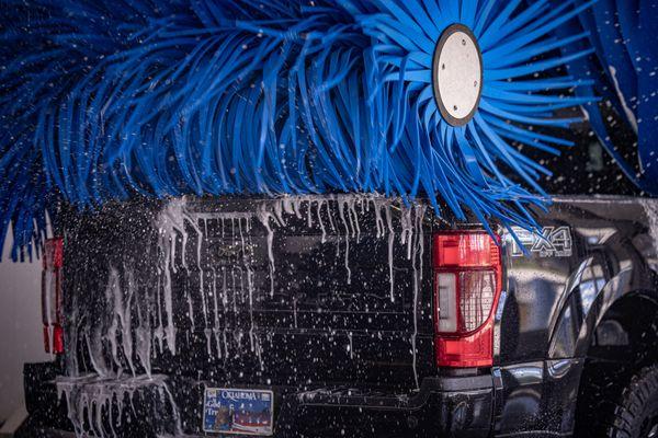 Okie Express Auto Wash uses high-quality microfiber soft cloth and foam material within our wash tunnels that are effective at removing dirt