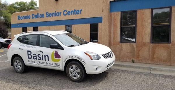 Basin car parked in front of the Bonnie Dallas Senior Center.