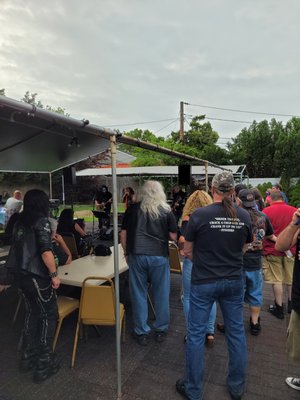 Small  view of our covered patio, seating for 150, yet this band gathered a standing growd...lol