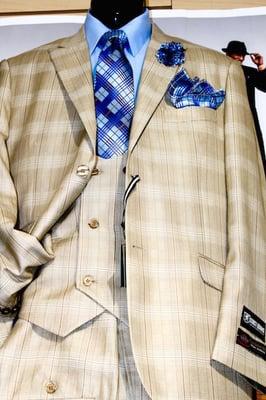 Tan Plaid Suit coordinated with matching Navy Tie, Lapel Pin and Pocket Square ensemble.