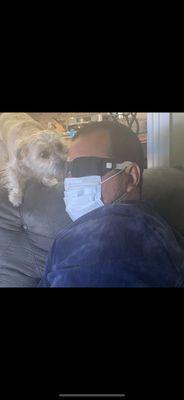 My Husband recovering & our puppy happy that his daddy can see again!!!!