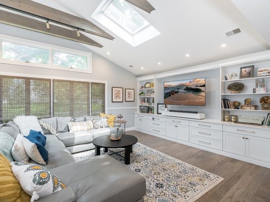 Great room with custom built in cabinets