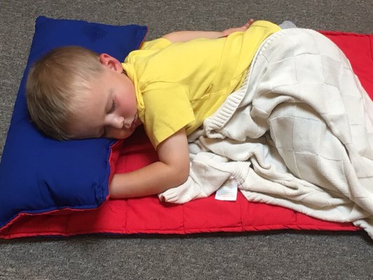 After all of their hard work and play throughout the day, nap time is taken just as seriously by our kiddos!