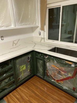 Cabinet painting and countertop installation