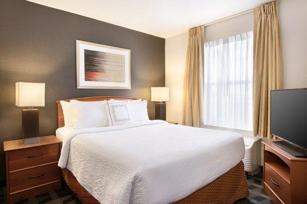 Our one-bedroom suite features a plush, queen bed, comfortable décor and a flat-screen HDTV for your enjoyment.