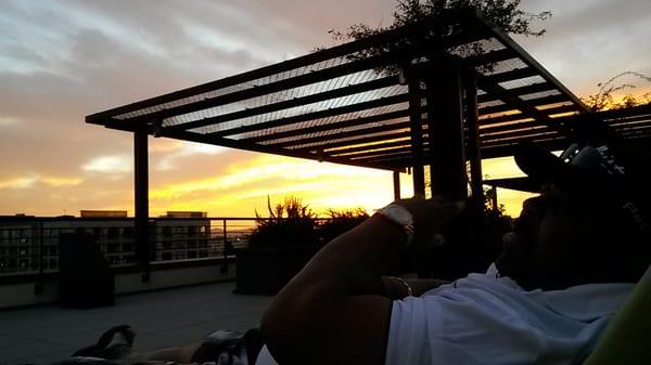 Loungin on the roof at sunset