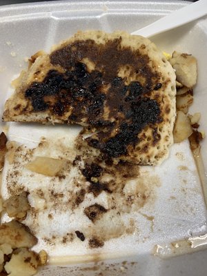 Burnt chocolate chip pancake melted styrofoam takeout container. Tasted like plastic, unfortunately inedible.