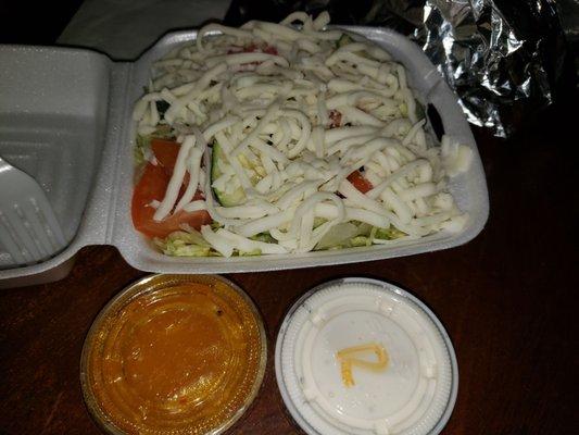 Small garden salad. Mmmm good, tangy Italian dressing!