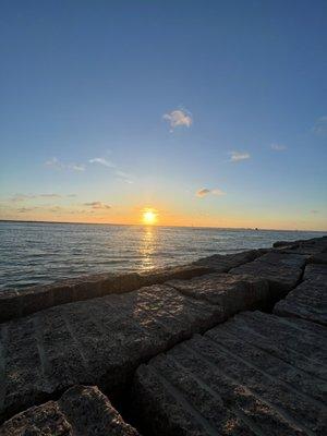 Jetty great place to watch the sun come up! And ships and dolphins!